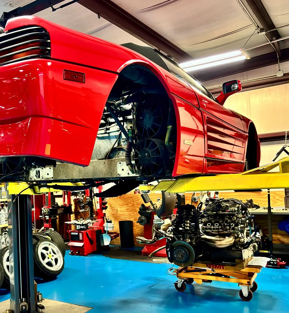 Ferrari service, repair, and restoration at GTM & SON with expertise spanning engine, drivetrain, and full mechanical work, serving classic and modern models since 1977 and former official Ferrari service center in Brussels.