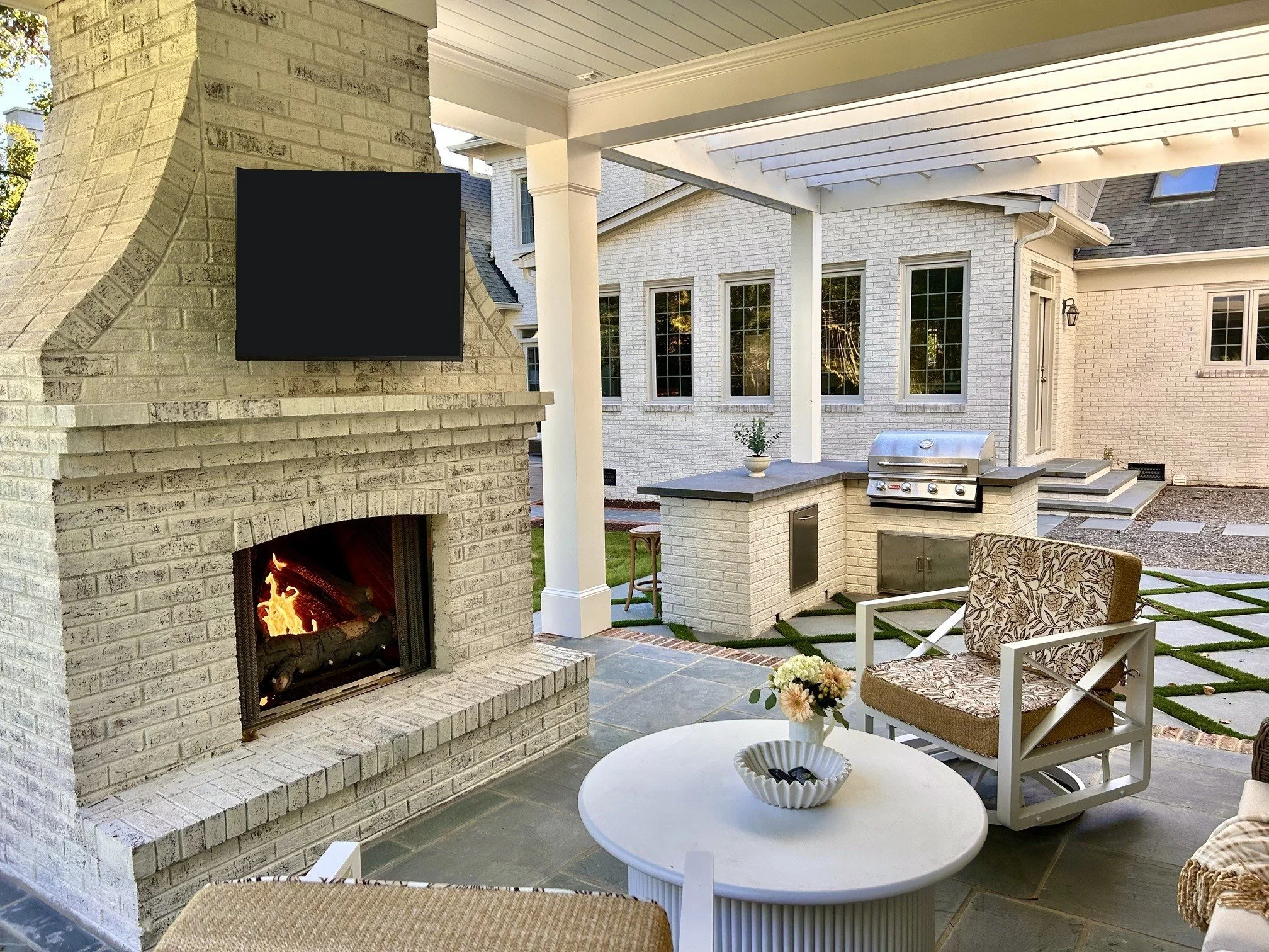03-covered-porch-brick-fireplace.jpg