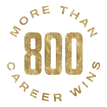 Golden logo with the text "More Than 800 Career Wins" in a circular layout.