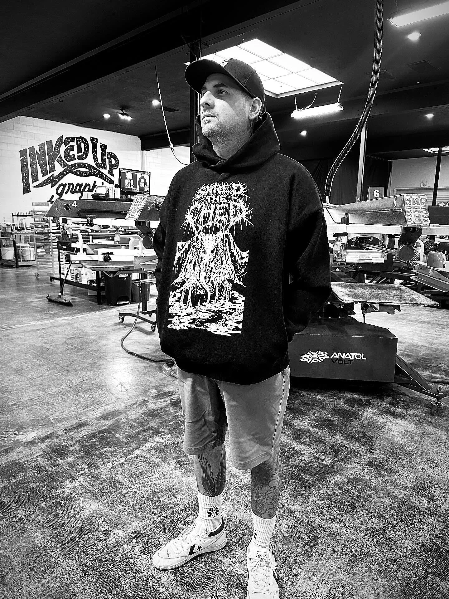 Check out this LAT heavyweight hoodie. Made with side seam pockets rather than the usual front pocket, it offers a seamless front panel perfect for oversized artwork.