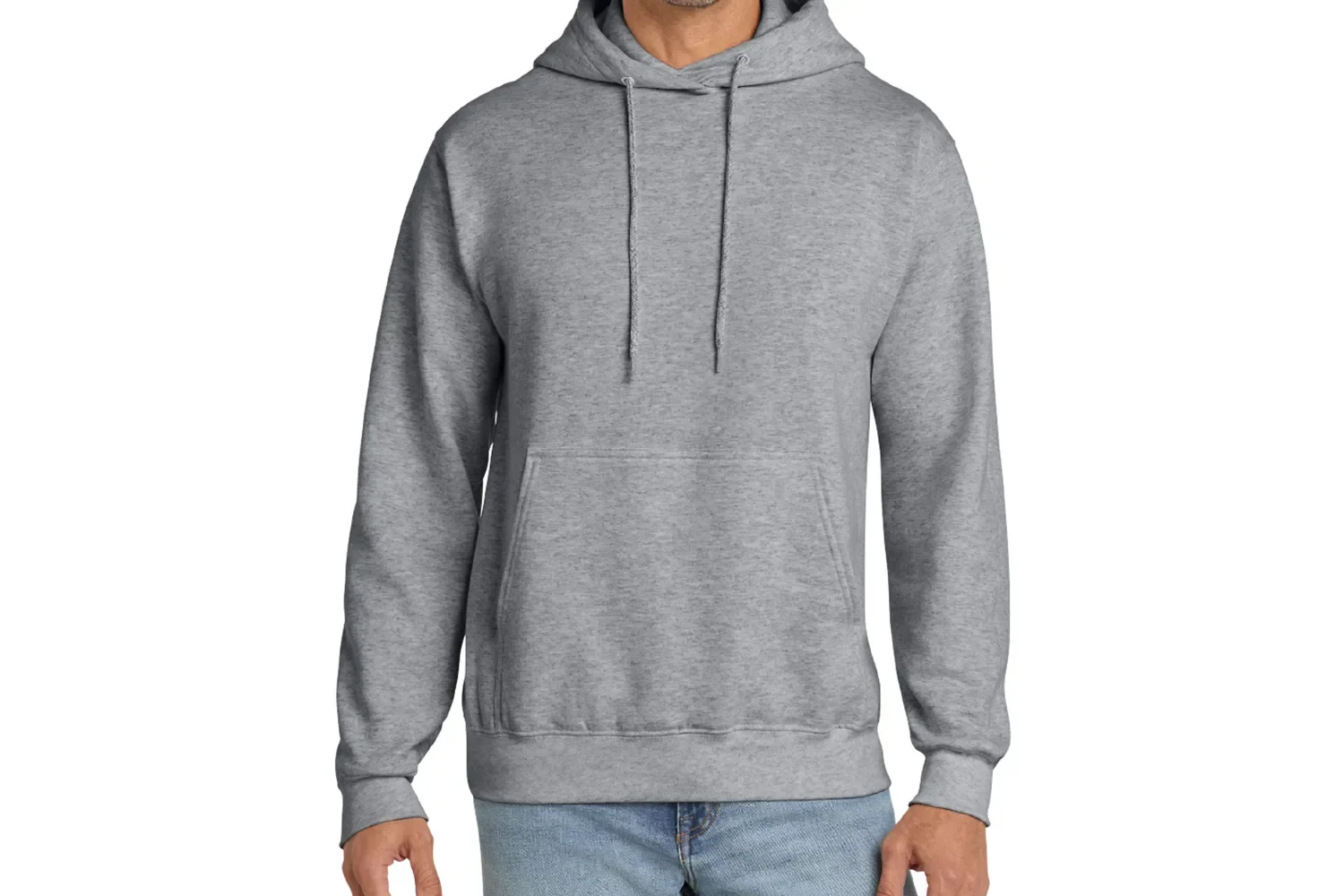 A person wearing a gray hooded sweatshirt and blue jeans.