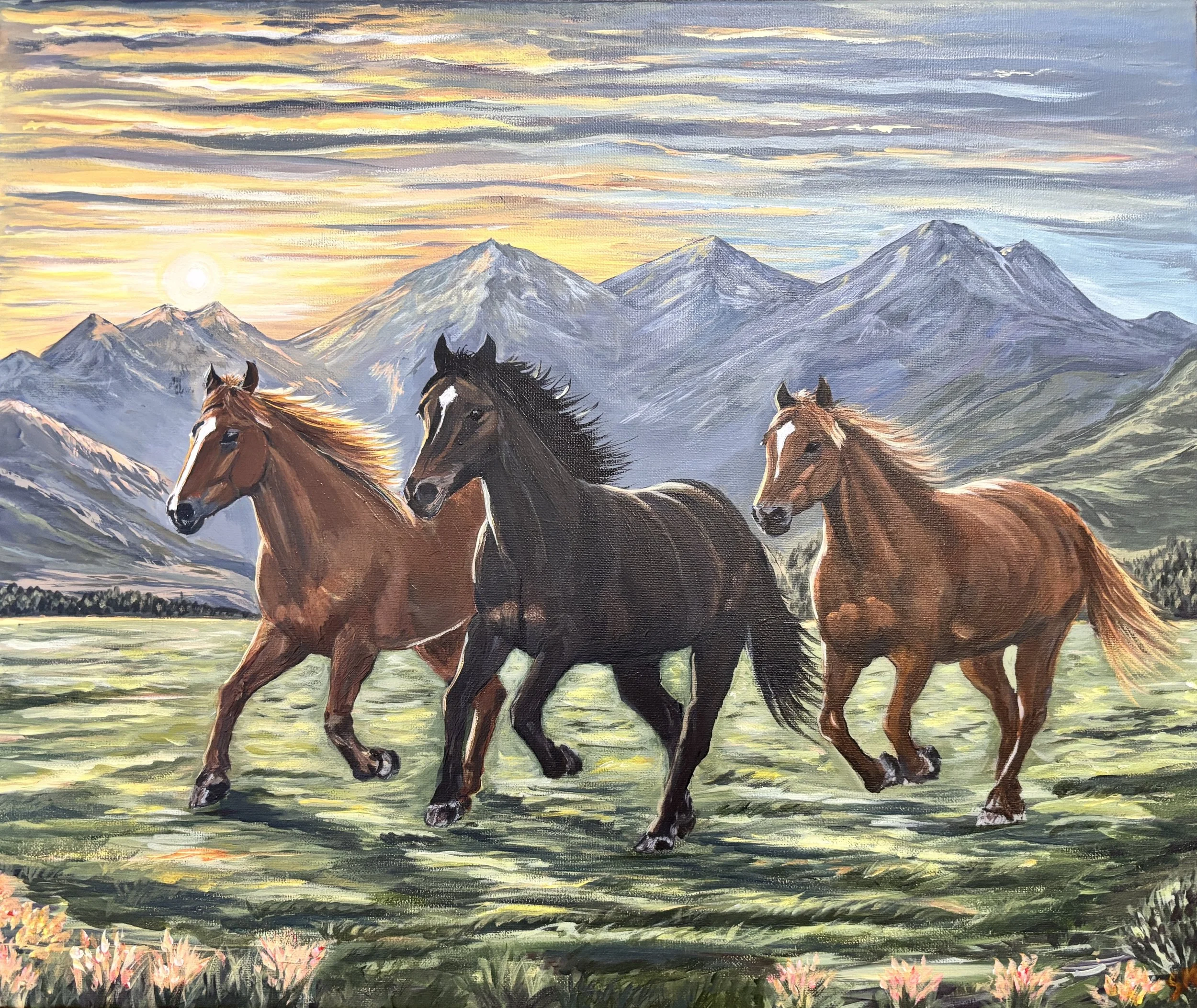Painting of three horses running across a grassy field with mountains and a setting sun in the background.