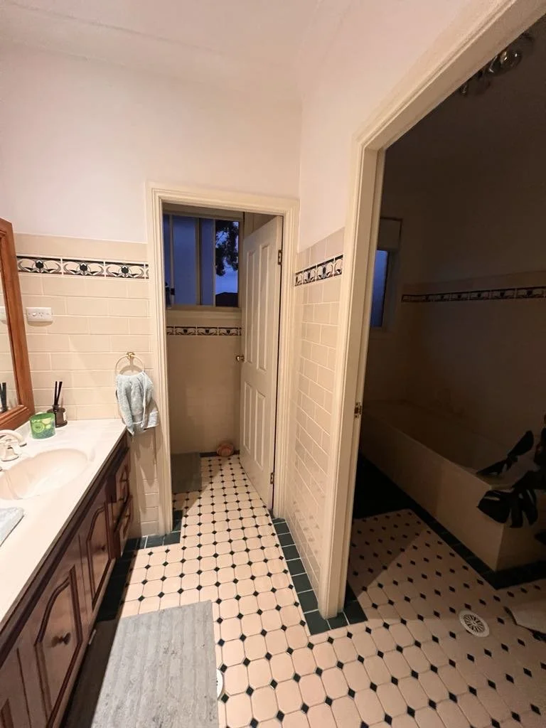 Before image of a bathroom redesign by Bortolazzo Interior Design