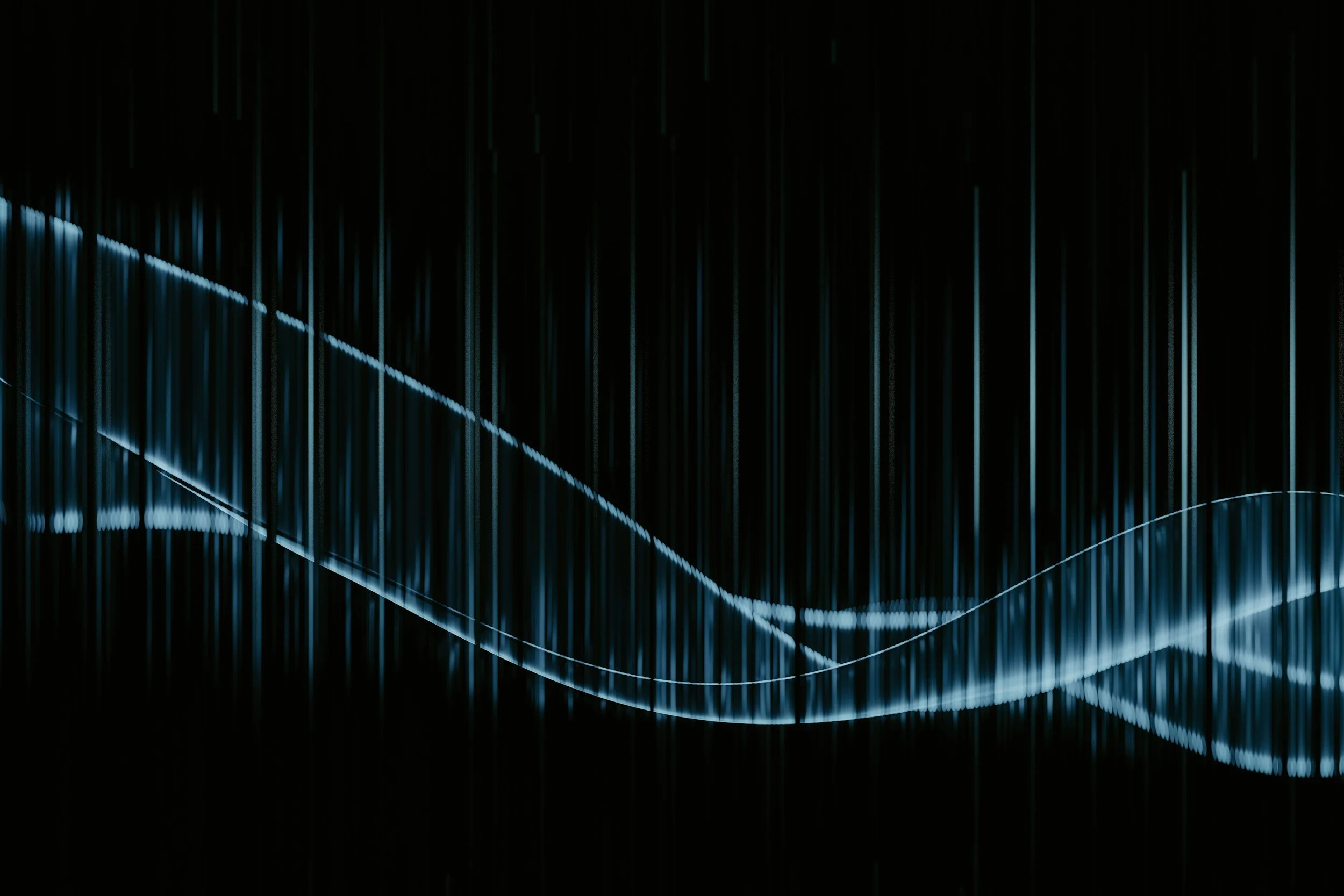 Digital data visualization with vertical lines and two overlapping wavy lines in blue and white on a dark background.