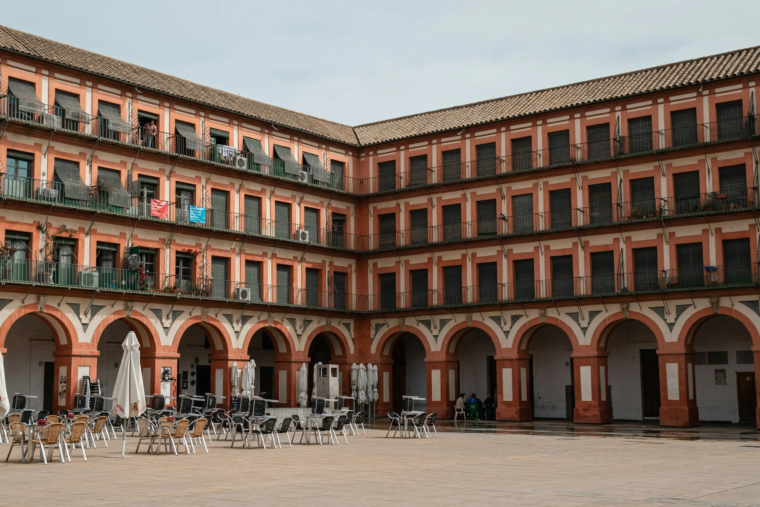 Terrace dining in a historic Spanish plaza