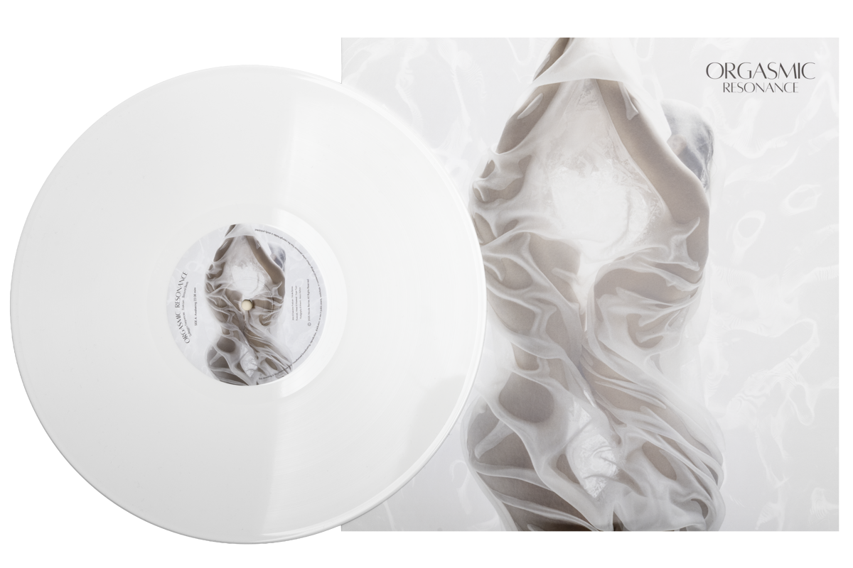 A white vinyl record with a cover featuring a photo of a woman in a flowing dress, lying on white fabric, with the title 'Orgasmic Resonance' in the top right corner.