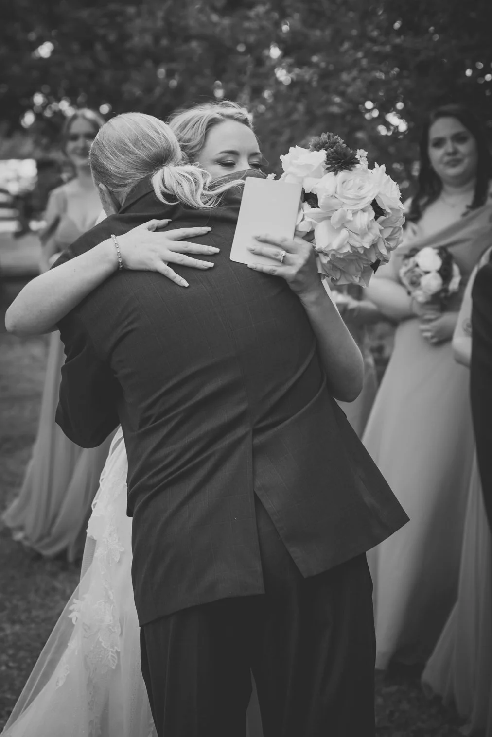 emotional bride maryland wedding candid moment with family