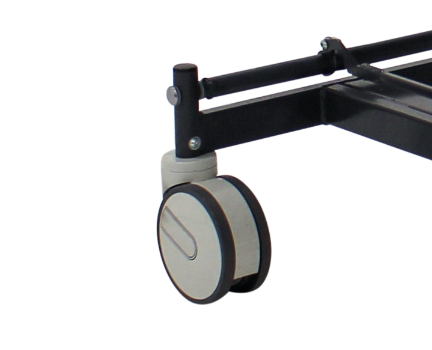 Close-up of a hospital bed wheel with a black metal frame and gray wheel.
