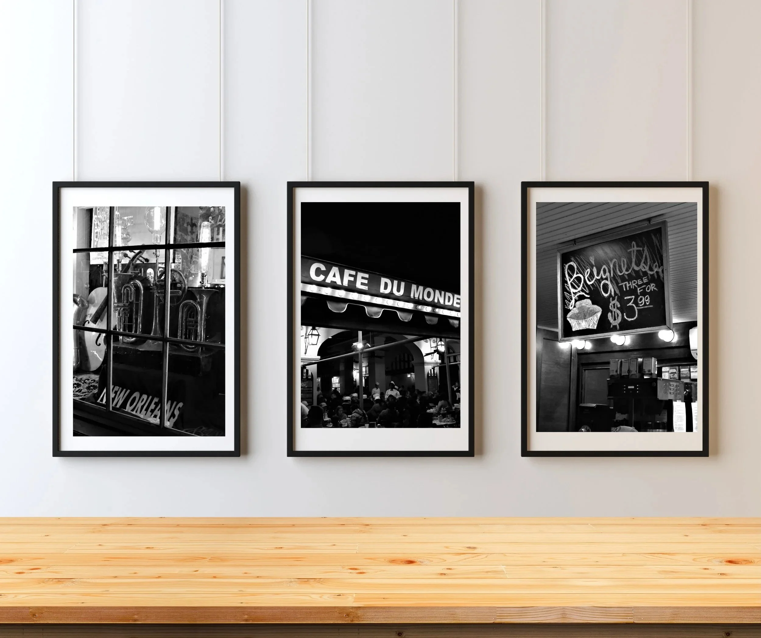New Orleans Night Cityscapes Collection - set of three black and white vertical photographs of the popular Cafe du Monde, a storefront window, and Jazz in the Park's chalkboard sign. Available as digital downloads in a separate Etsy listing. Monika H
