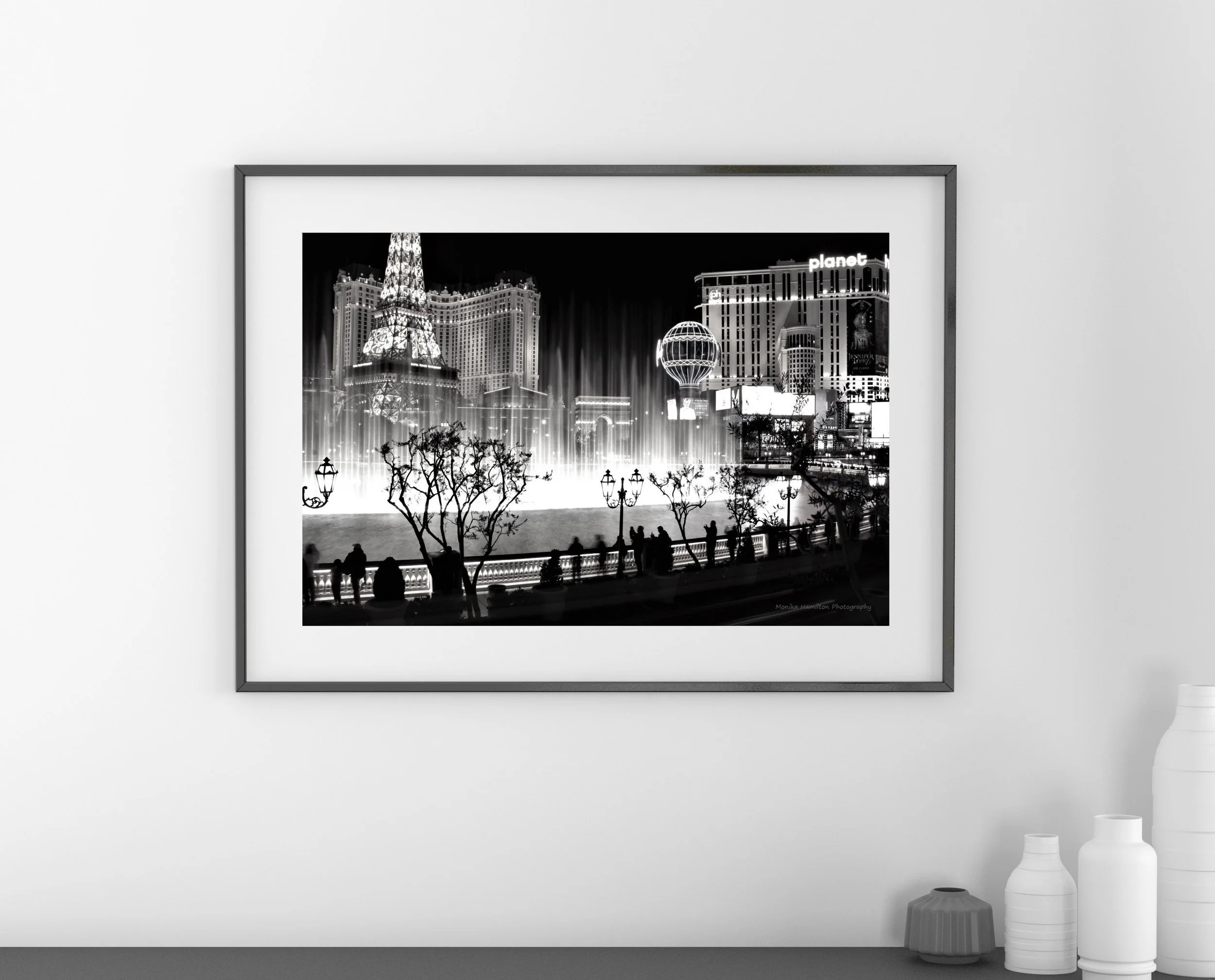 Bellagio Fountains, Las Vegas - black and white photo of the lively Las Vegas strip. Available in colour, as a canvas or photo print, a digital download, or coffee mug in separate Etsy listings. Monika Hamilton Photography