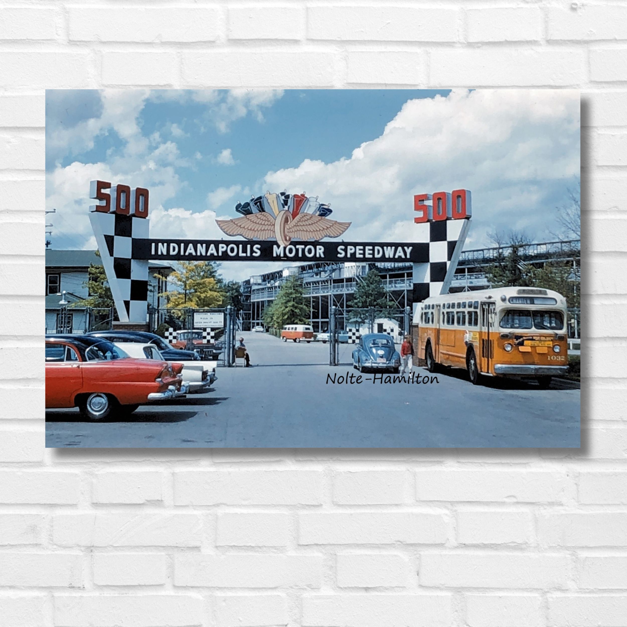 Indianapolis Motor Speedway's Main Gate in 1961 - vintage classic cars, a bus, and iconic checkerboard signage are featured in this original vintage photo my dad took. I scanned his slide of this fun retro picture.