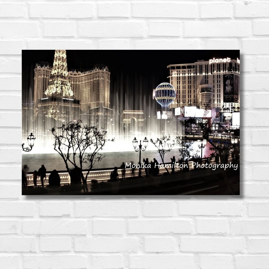 Bellagio Fountains, Las Vegas - Nighttime long exposure of the iconic fountains and cityscape. Available as a canvas or photo print, and digital download in separate listings in my Etsy shop. Monika Hamilton Photography