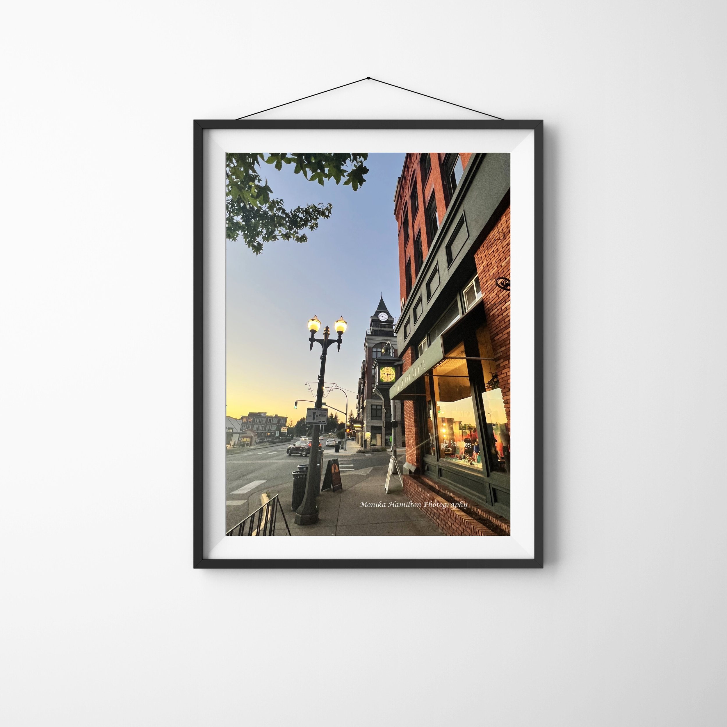 Historia Fairhaven City Street Scene in Bellingham, Washington - Picture of local shops, the clock tower, and a streetlamp at sunset in this quaint village. Monika Hamilton Photography