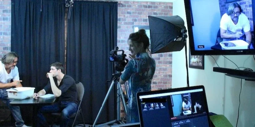 acting a scene on camera - woman operates the camera