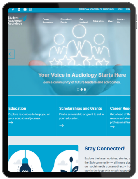 Tablet displaying the website of the Student Academy of Audiology with a blue background, menu options at the top, and a main section with a slogan 'Your Voice in Audiology Starts Here' and icons of three professional figures with stars.