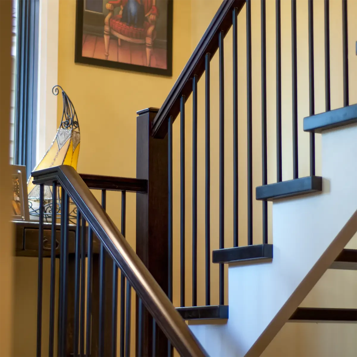 Custom Open Riser Stair and Railing with steel metal spindles for Amsted Design Build in Ottawa (Nepean)