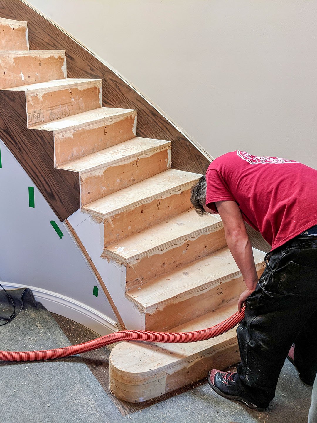 Campbell's Woodcraft works on building a stair recap in a home in Stittsville.