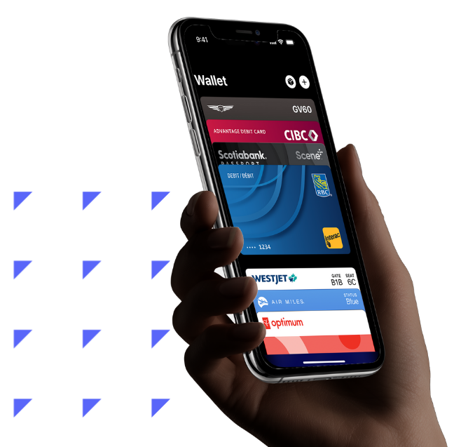 A person holding a smartphone with a digital wallet app displaying multiple credit cards.