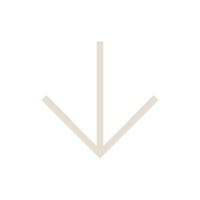 Downward pointing beige arrow