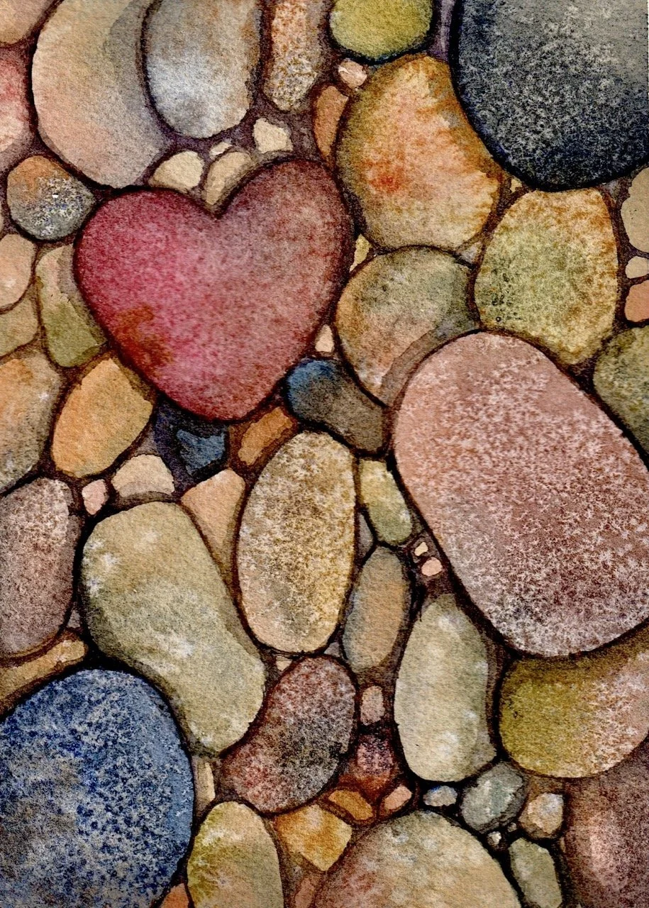 Painting of multicolored stones, with one stone shaped like a red heart.