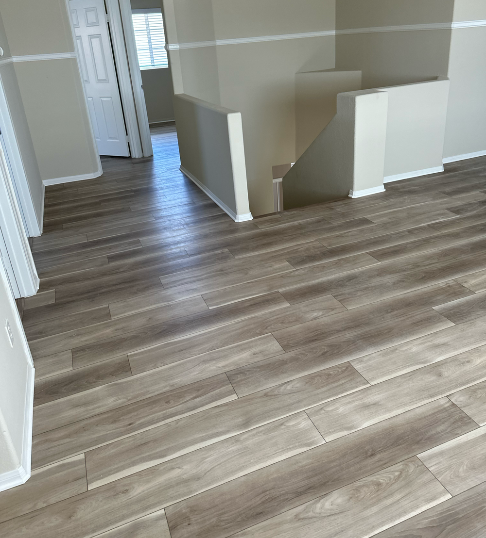 Laminate flooring installed in Rancho Cucamonga living room โ Mirage Flooring