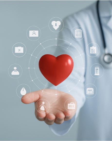 A healthcare professional holding a red heart model with medical and health icons surrounding it.