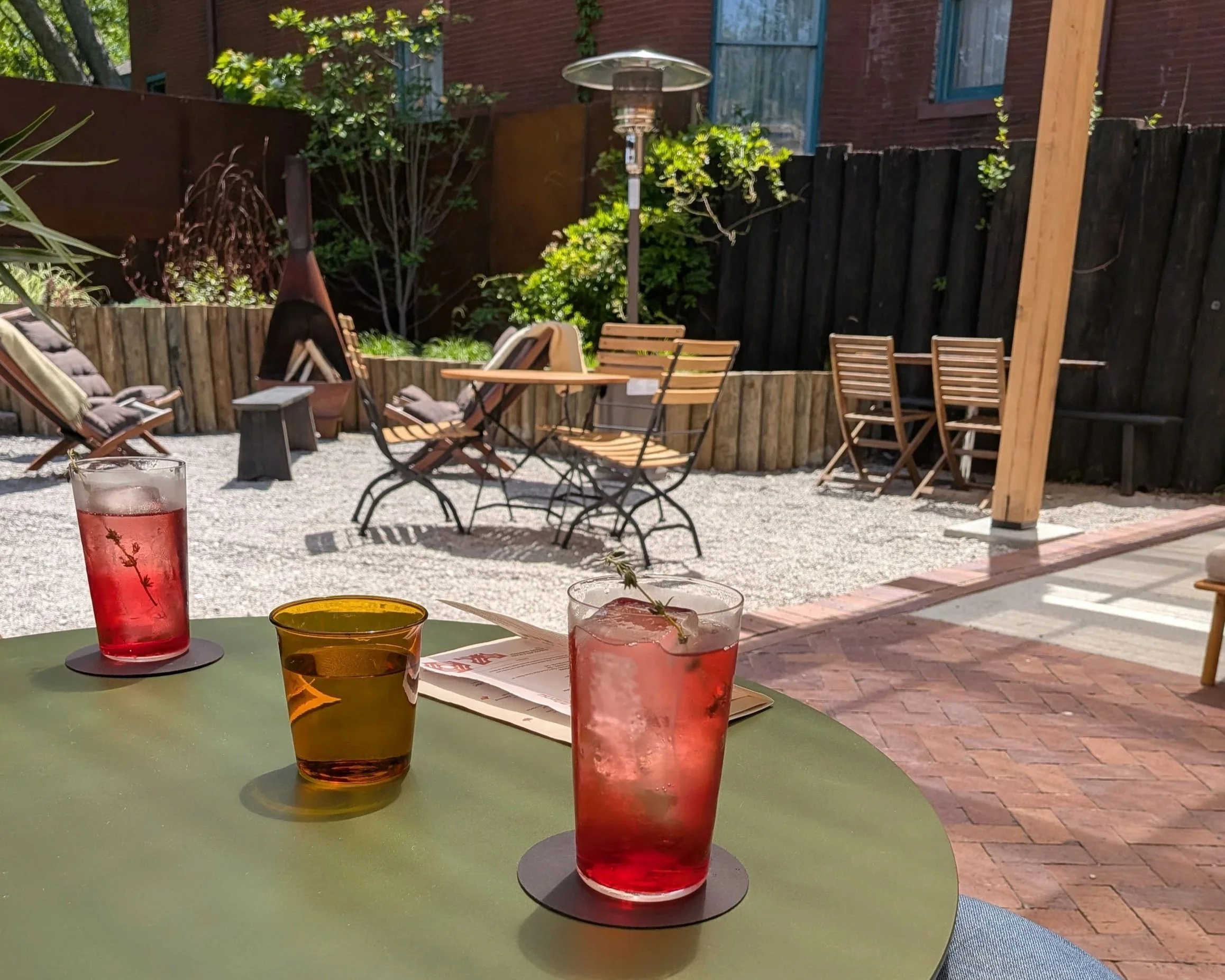 Cocktails on a patio table at XO Hifi in Kansas City