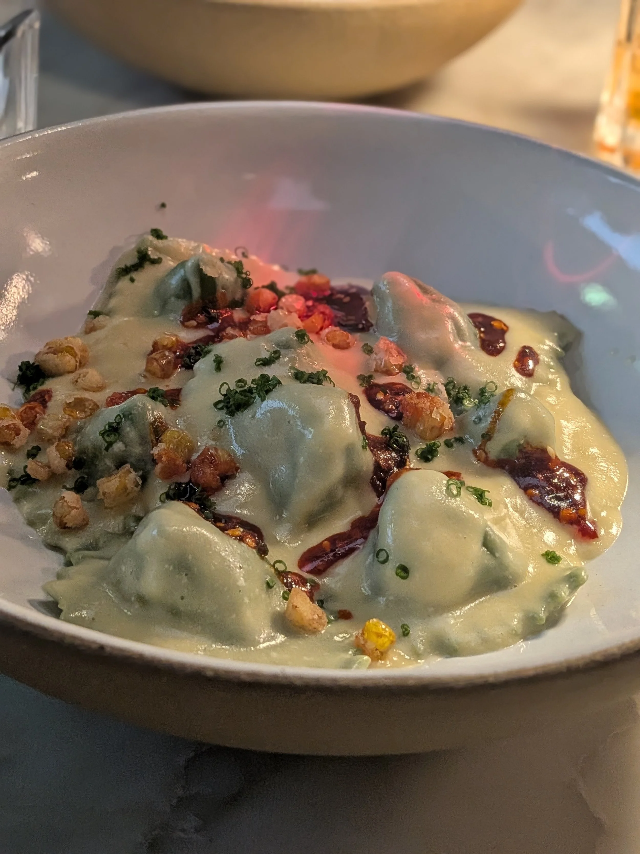 Bowl of stuffed pasta in a creamy sauce with calabrian chili from Zero Zero in Kansas City.