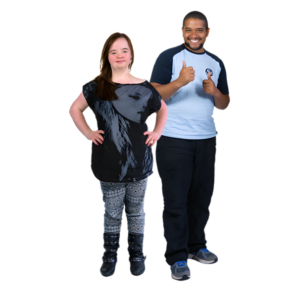 A young woman stands with her arms on her hips. She is next to a man who stands and gives the thumbs up.