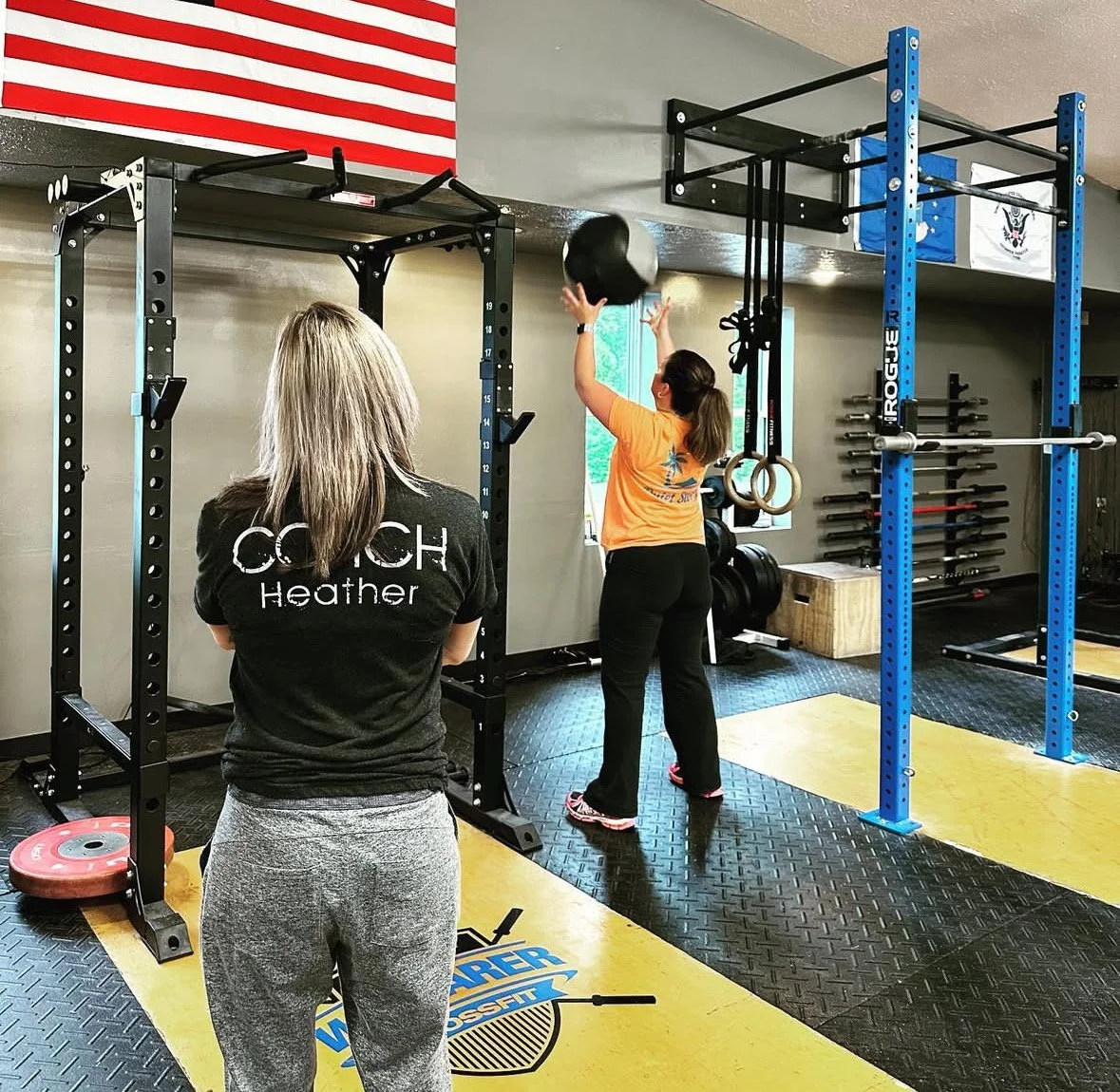 Coach Heather giving a private lesson to a student