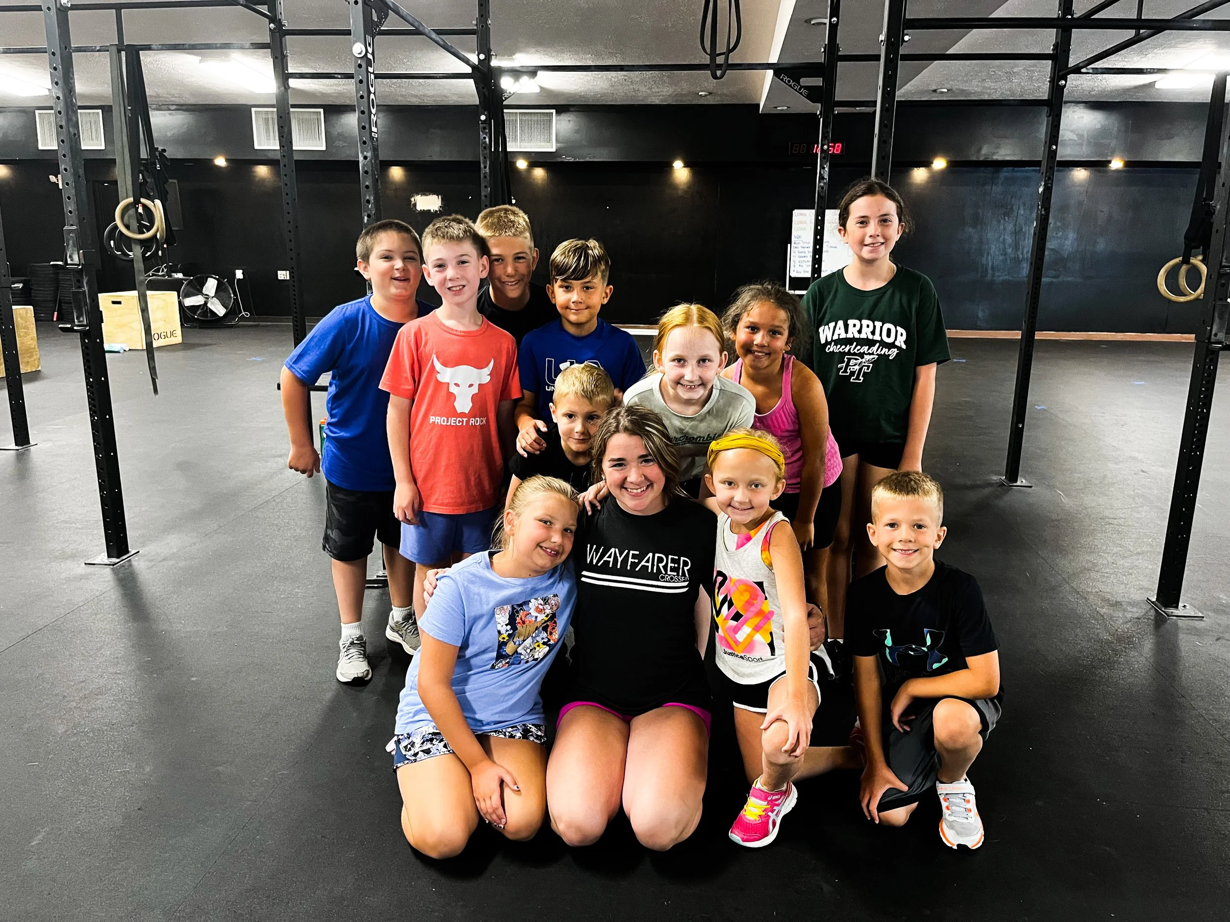 Coach Briauna with kids at Wayfarer kids camp.