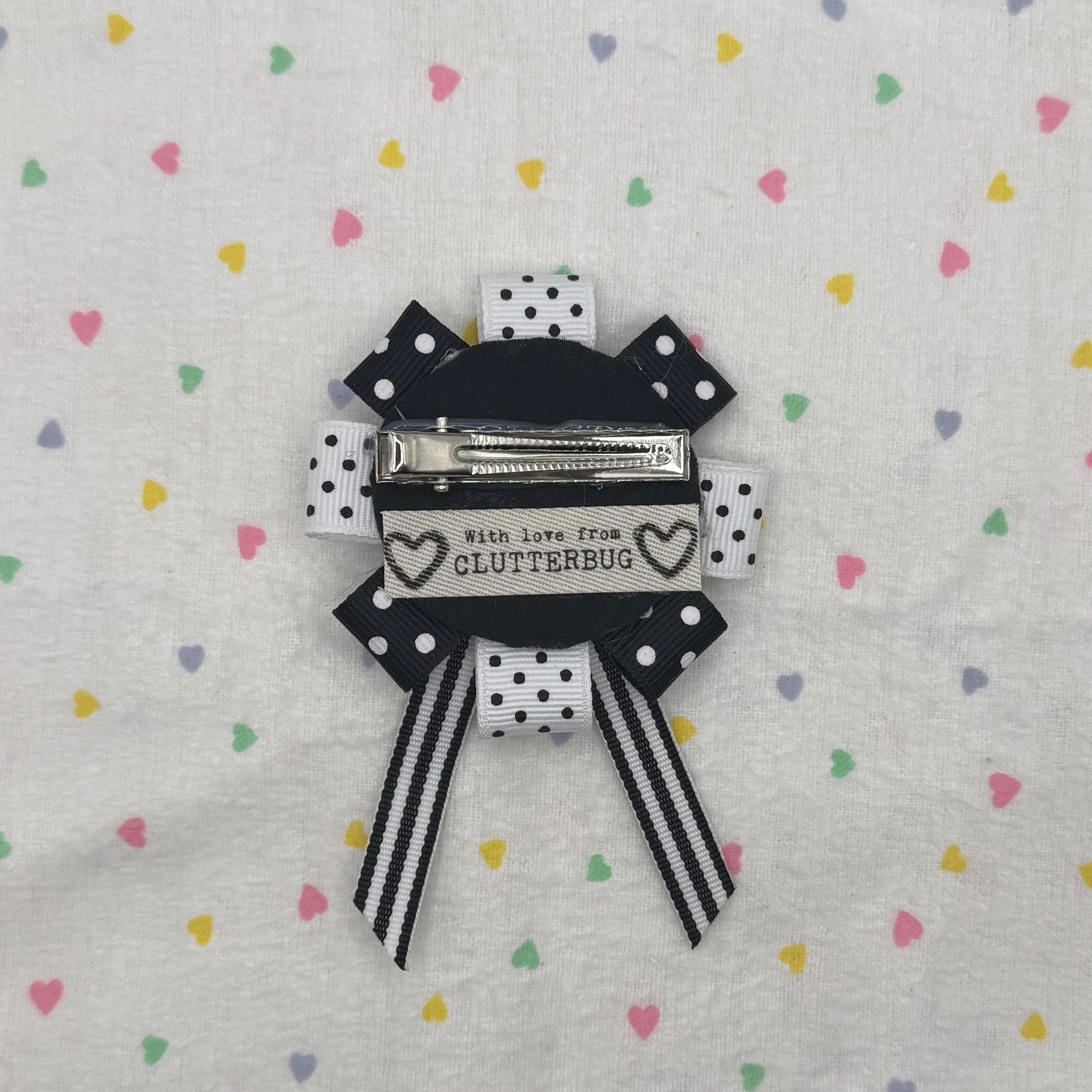 black and white polka dot button hair clips