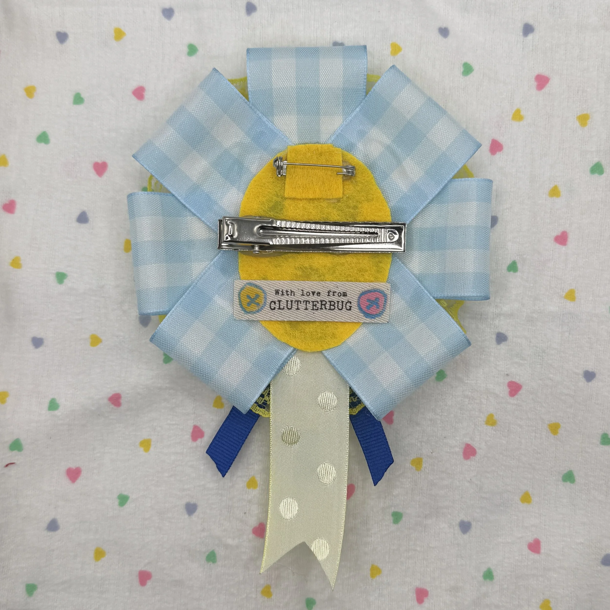 inkay pokemon yellow and blue ribbon hair clip