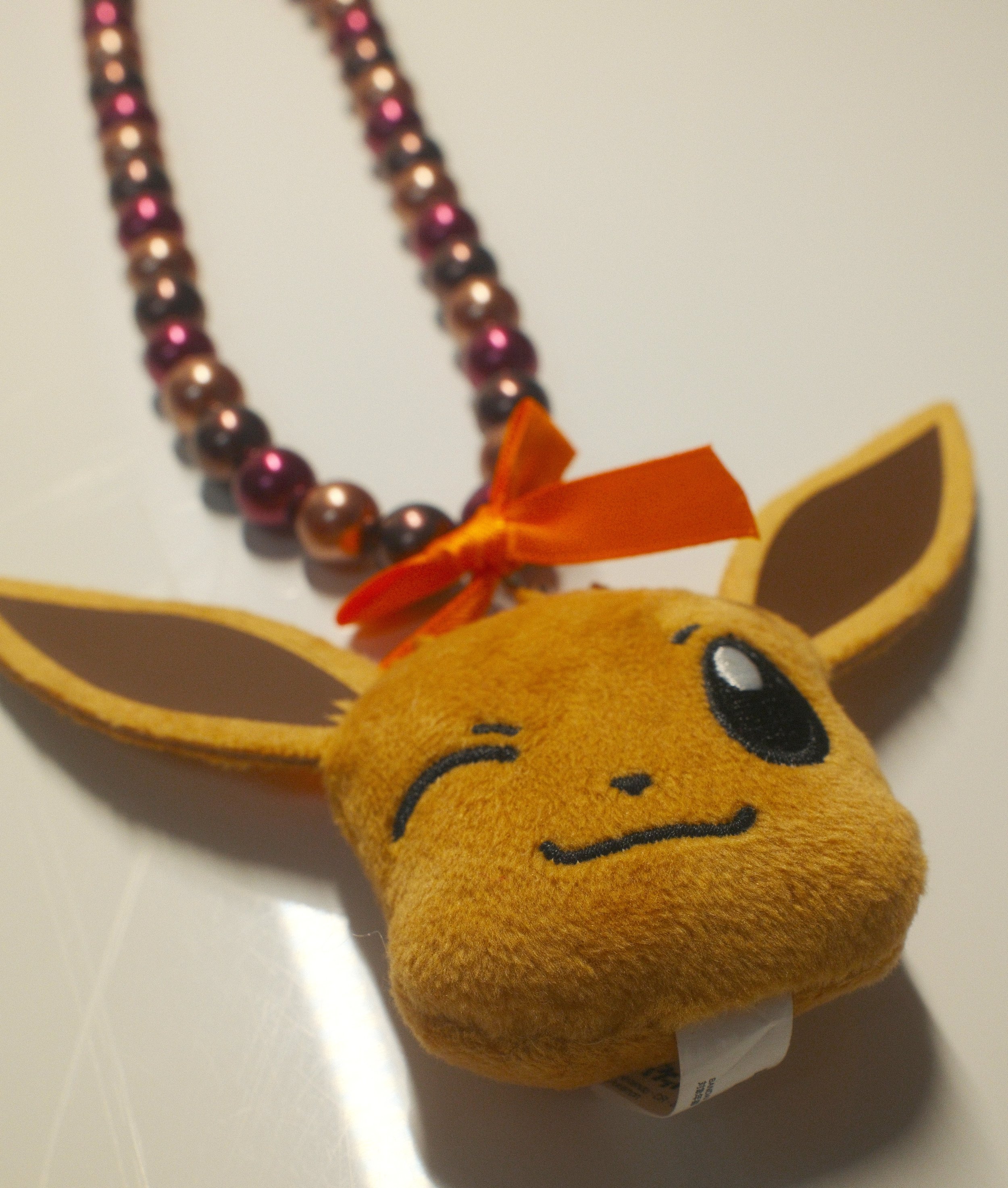 cute brown eevee plushy necklace