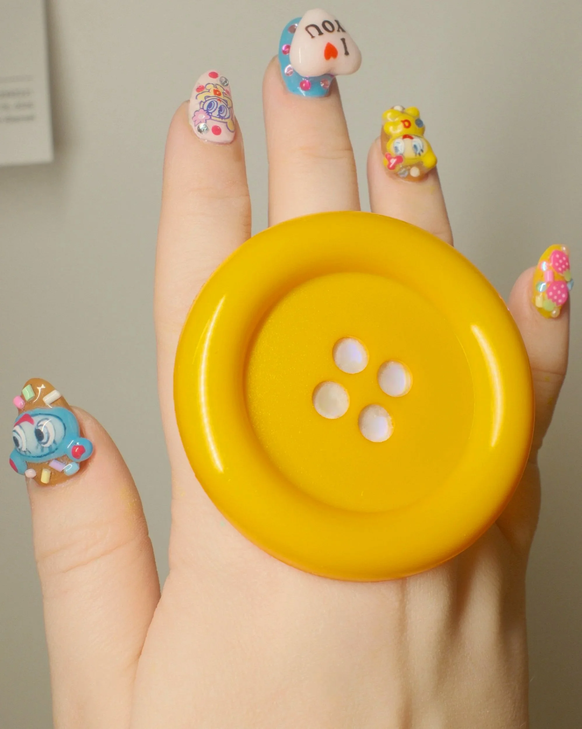 big yellow button adjustable ring