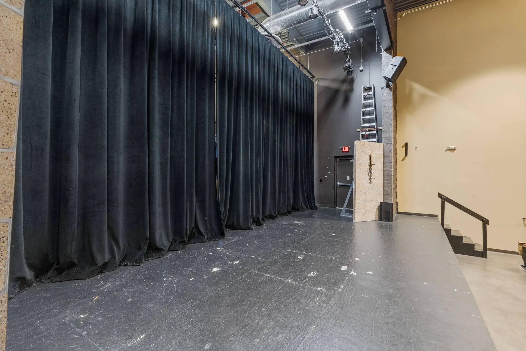 Empty stage in an auditorium.