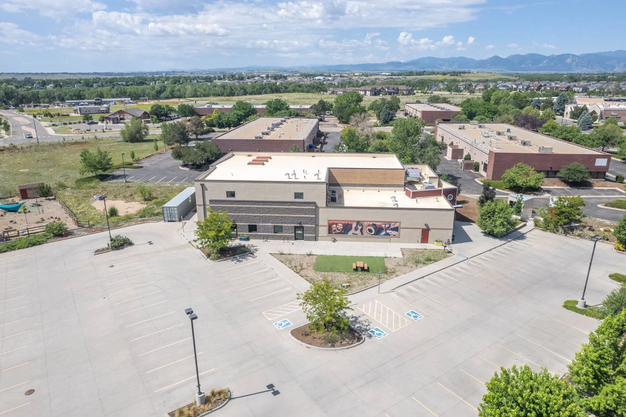 Aerial view of the Arts Hub and parking lot.