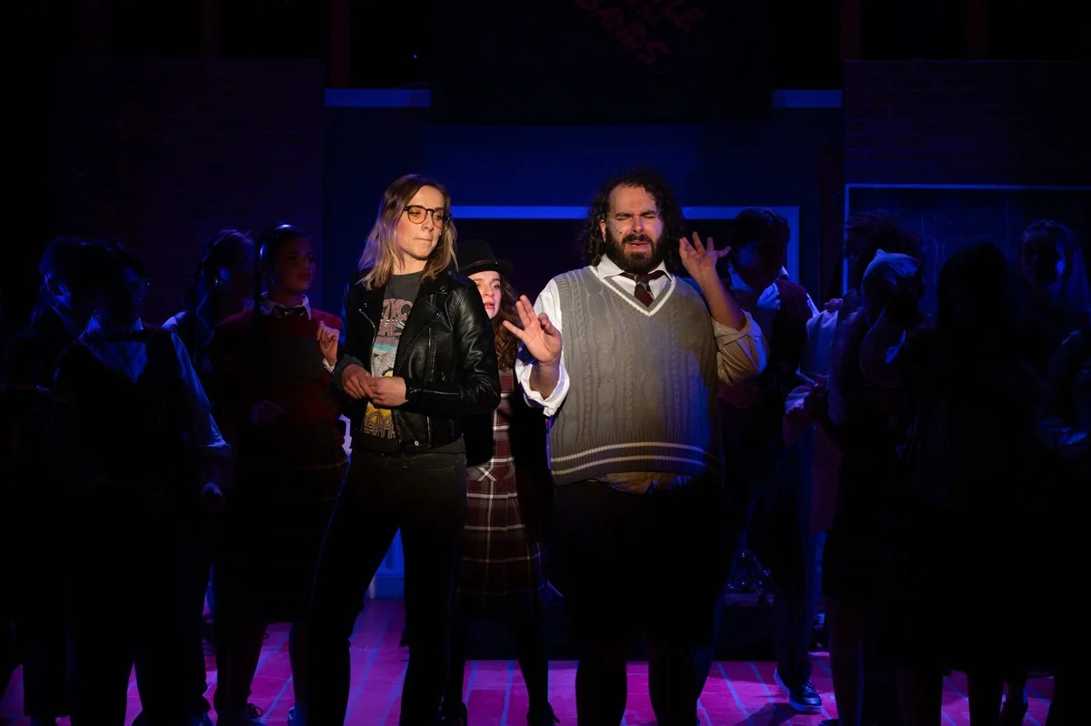 Group performance on stage.