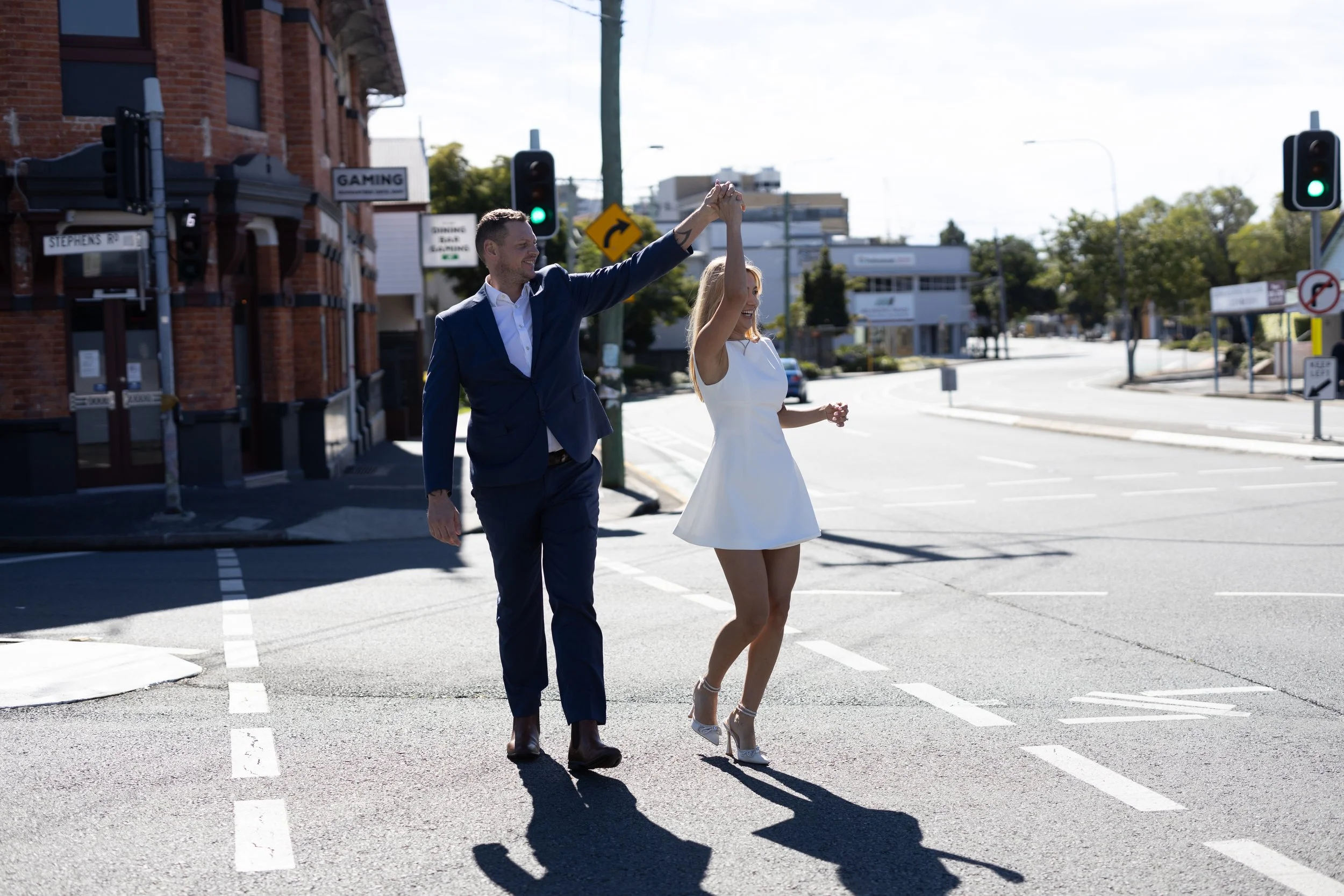 Laurie’s customers, Larissa and Emmett, just married walking off the aisle together.