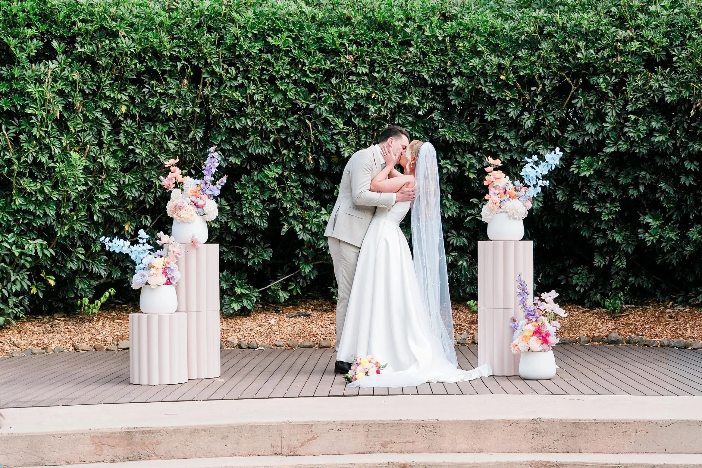 Laurie’s customers, Evan and Kade, running down a mountain after getting married. 
