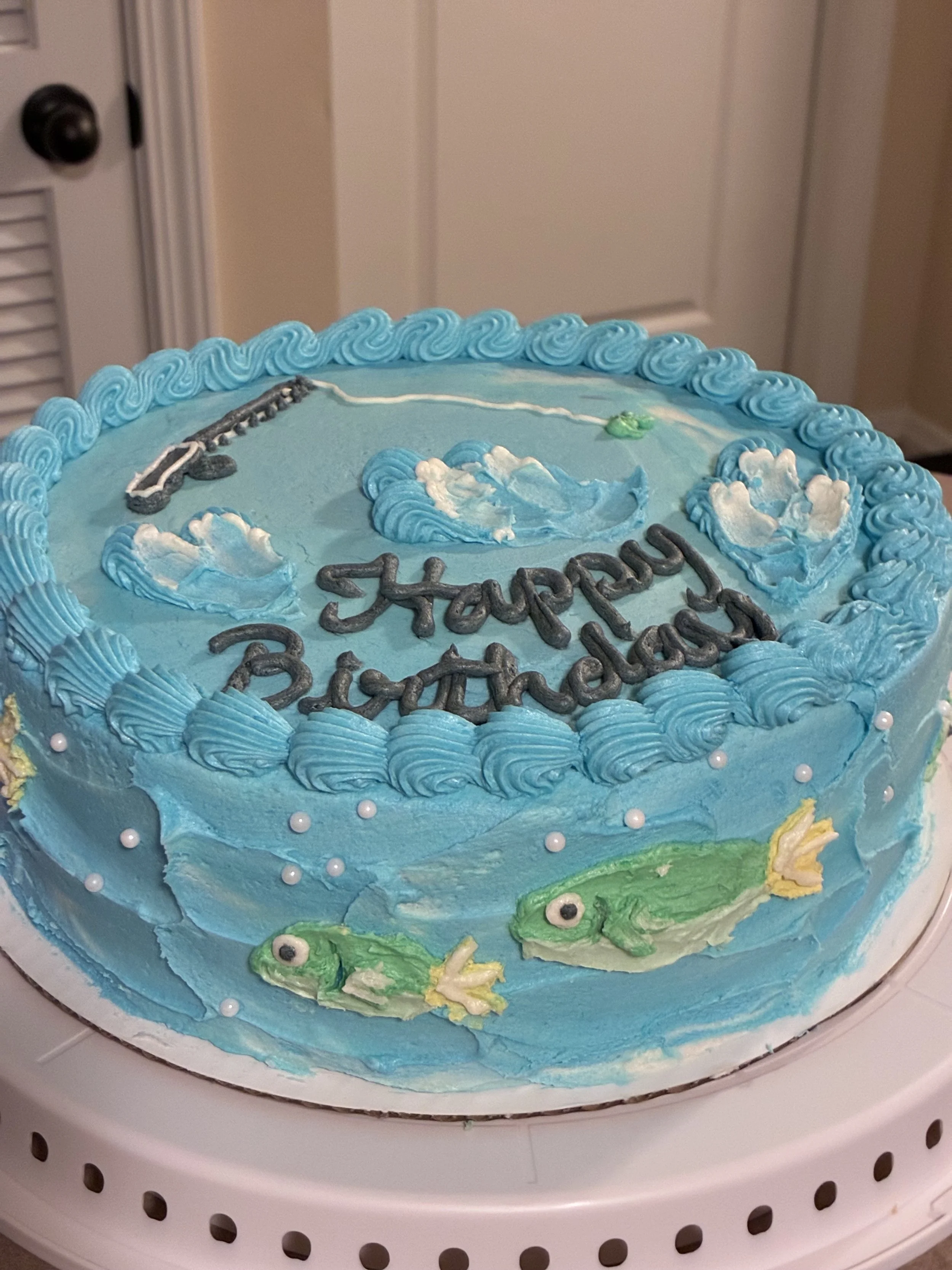 custom vanilla cake and buttercream with fishing theme 