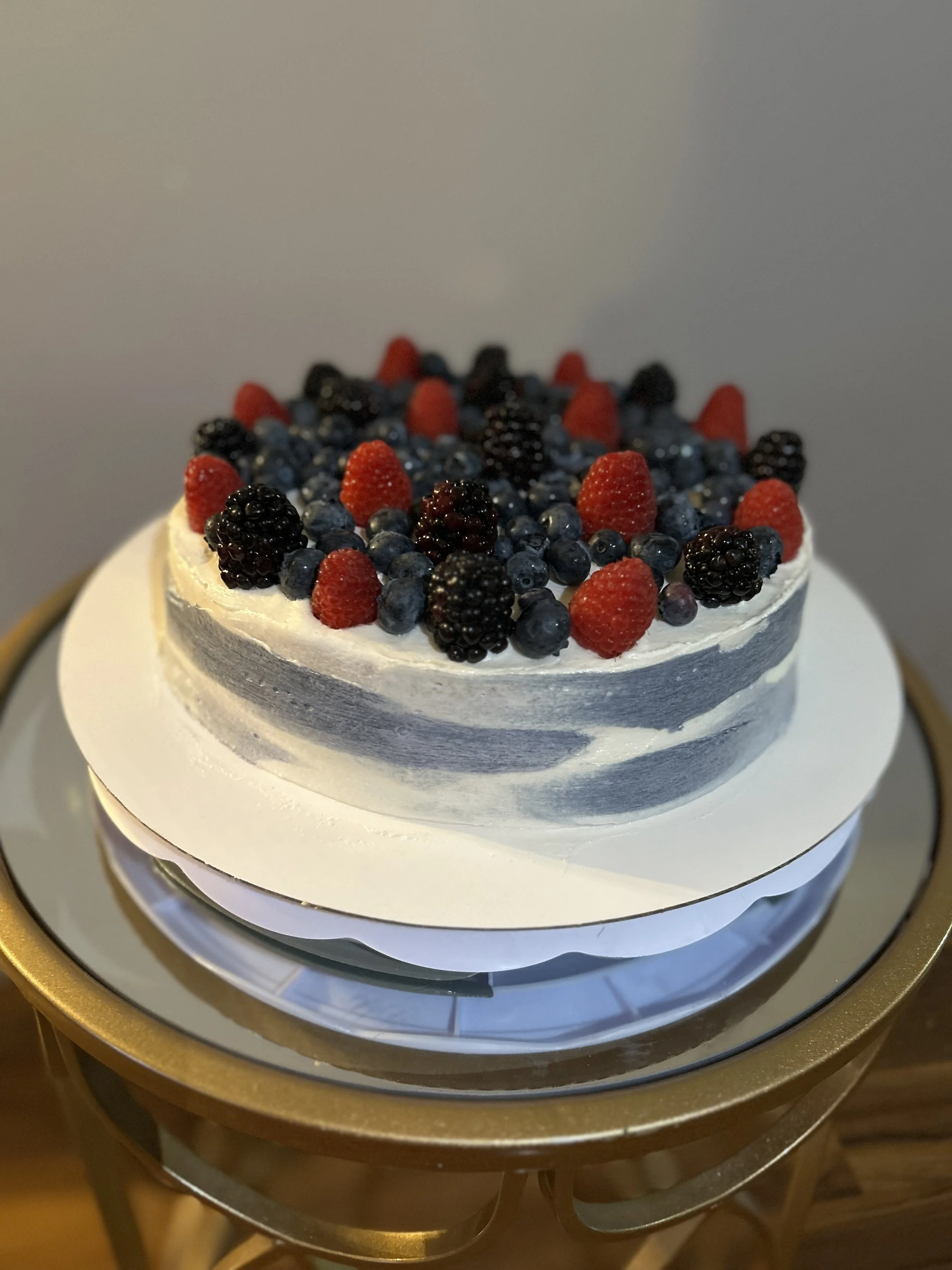  custom gluten free and vegan vanilla almond wedding cake with fresh berries