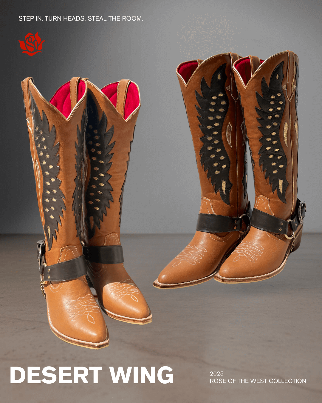  pair of tan western cowboy boots with black wing design and white embroidery on the toe, black strap and gold buckle detail, placed on a gray background
