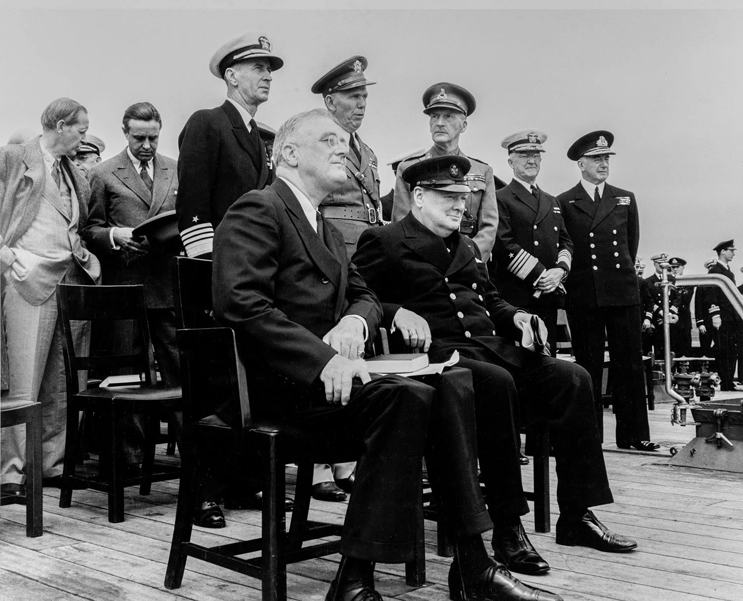 Commander in Chief. As war spread across the globe Roosevelt helped guide the nation from recovery to wartime mobilization, leading the United States through most of the Second World War.