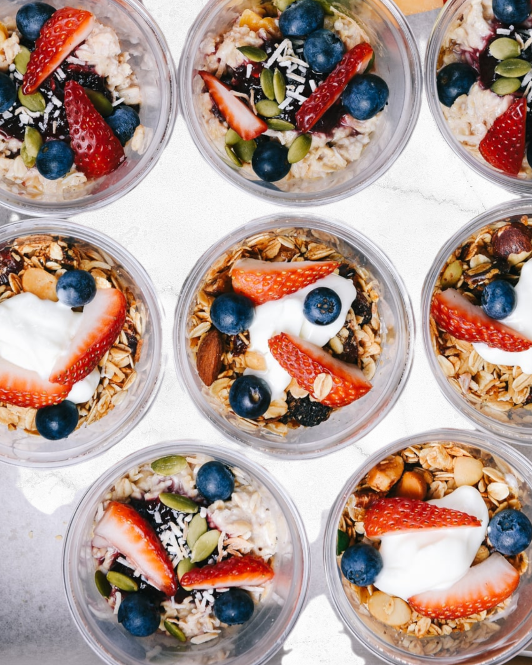 Grab & Go Workplace Menus are available. Here's a breakfast example with Greek yogurt, granola, strawberries, blueberries, chia seeds and shredded coconut.