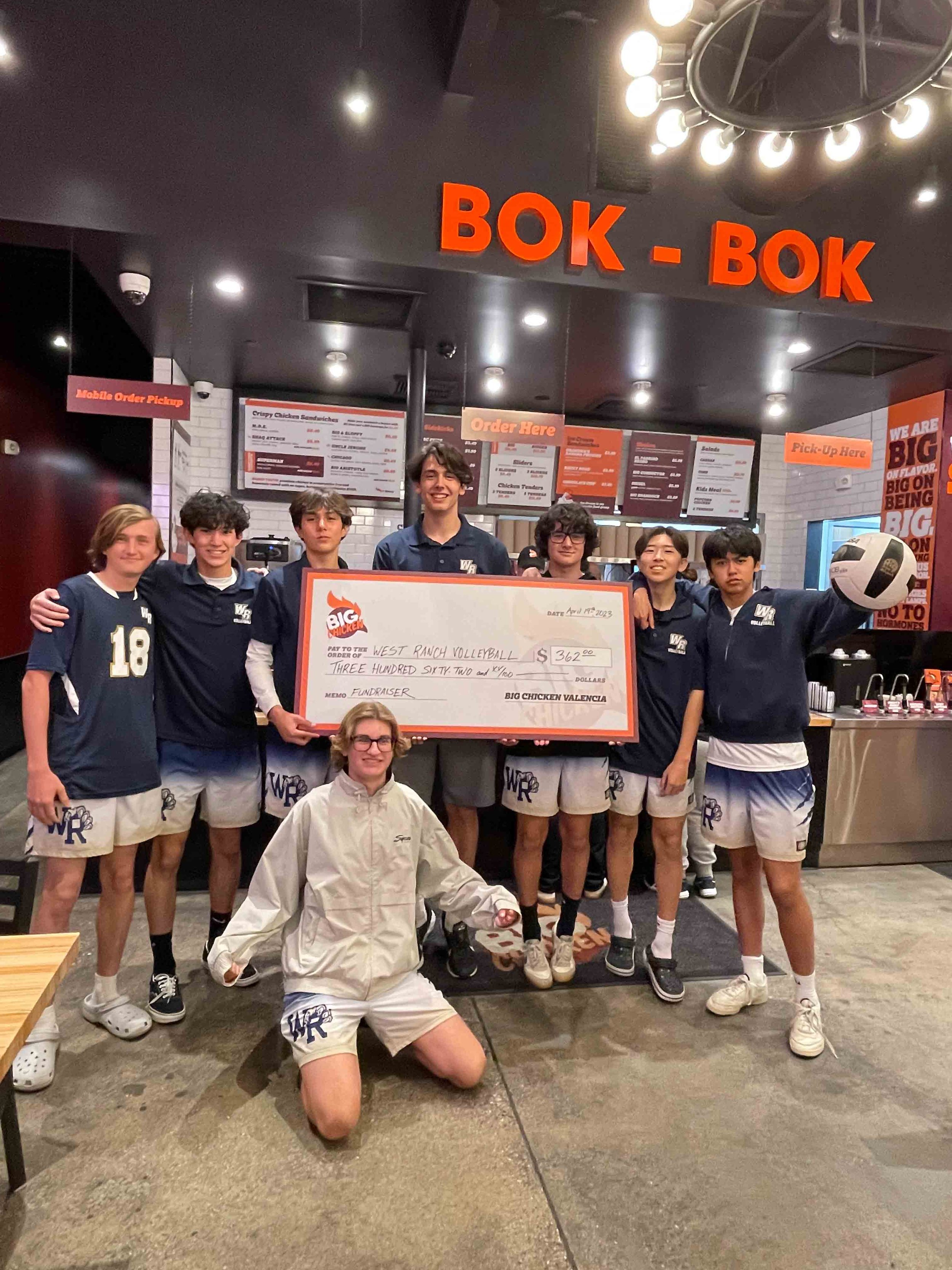 West Ranch Volleyball team with oversized check