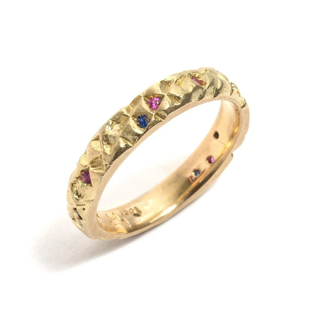 gold wedding band with coloured gemstones georgie brooks