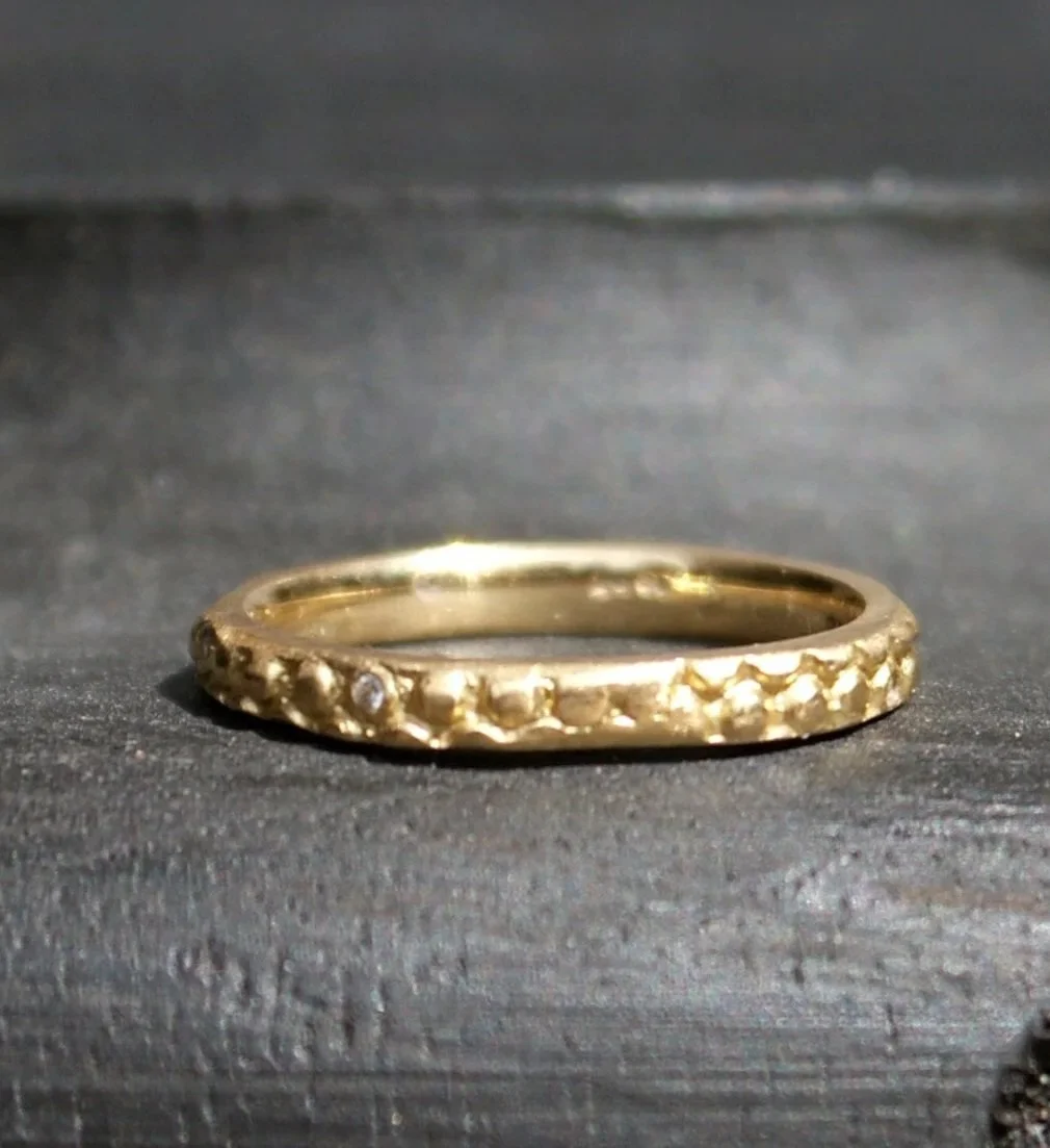 gold ring with diamonds