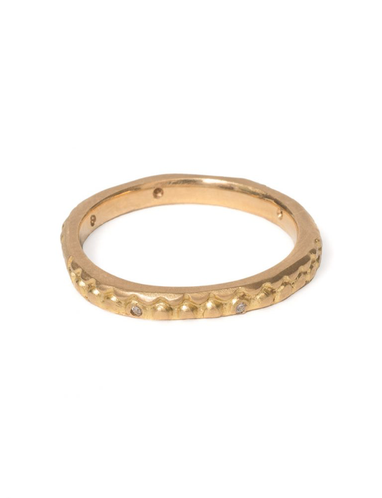 gold wedding band with diamonds