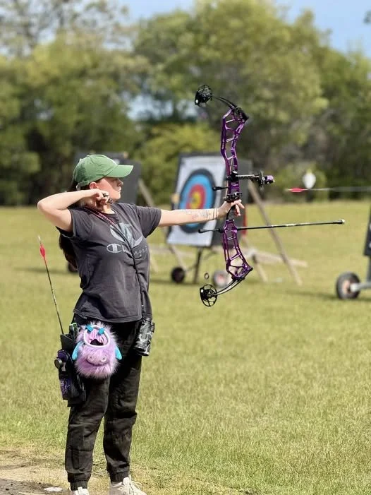 Isabel Canning with an arrow perfectly captured in flight!.jpg